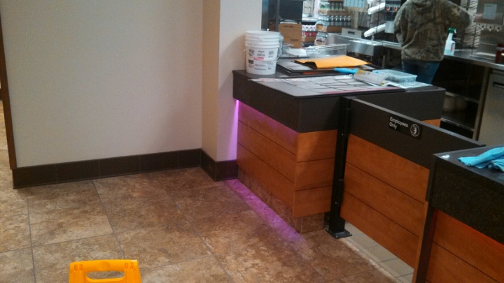 This image depicts a custom tile installation at Dunkin' Donuts. This tile flooring project was completed by Youngstown Tile & Terrazzo.
