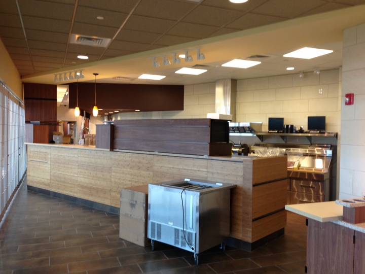 This image shows a commercial tile installation at a turnpike travel plaza. The tile was installed by Youngstown Tile & Terrazzo.